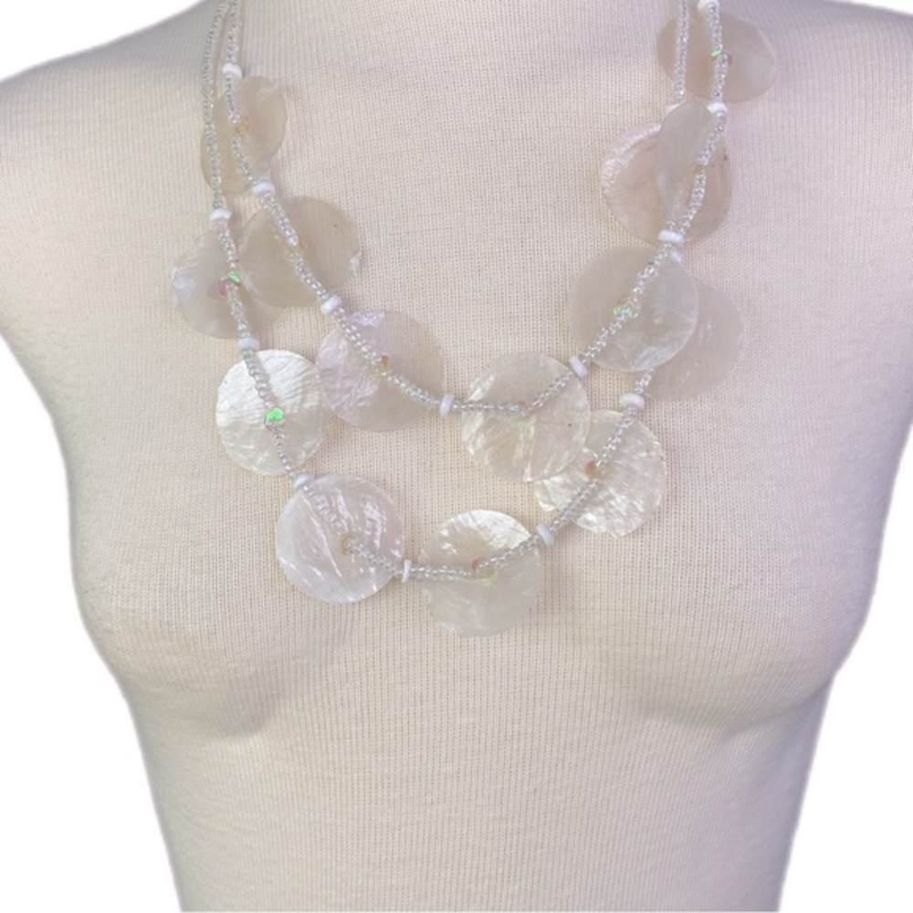 Lovely white iridescent shell inspired necklace with iridescent beading.